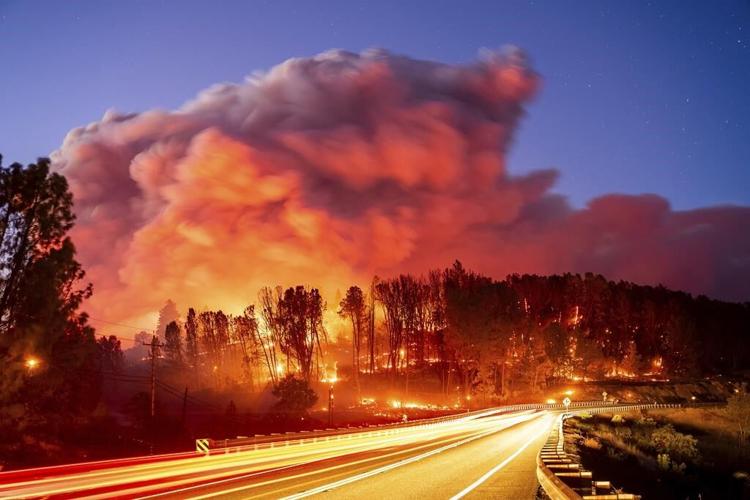 Wildfire sparked by a burning car triples in size in a day. A 42-year-old man is arrested