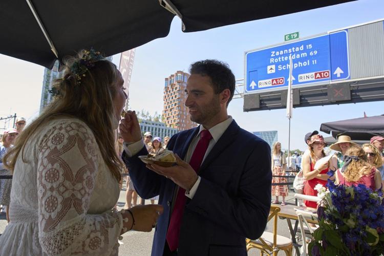Couples tie the knot during a festival on an Amsterdam ring road