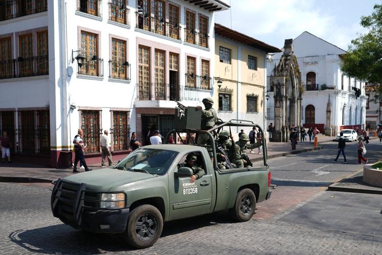 Authorities arrest 7 bodyguards in connection with a Mexican mayor's assassination