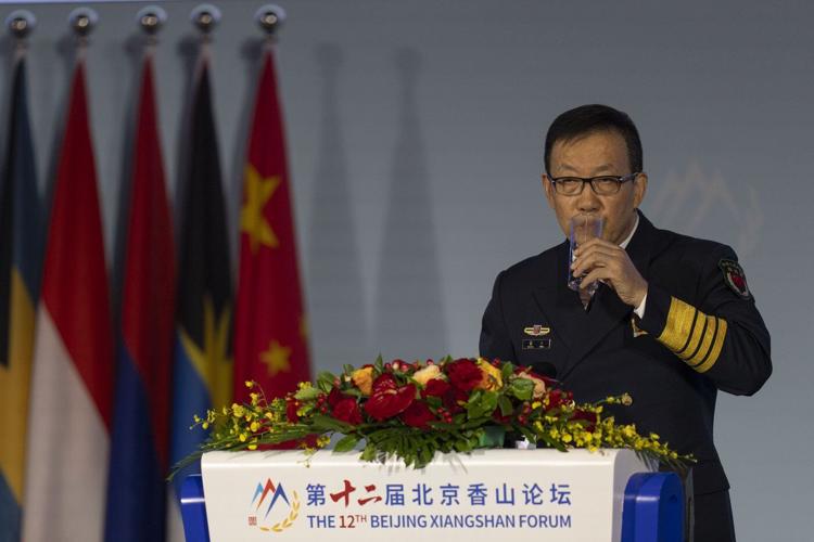 China's defense minister renews threats to take over Taiwan as he opens security forum