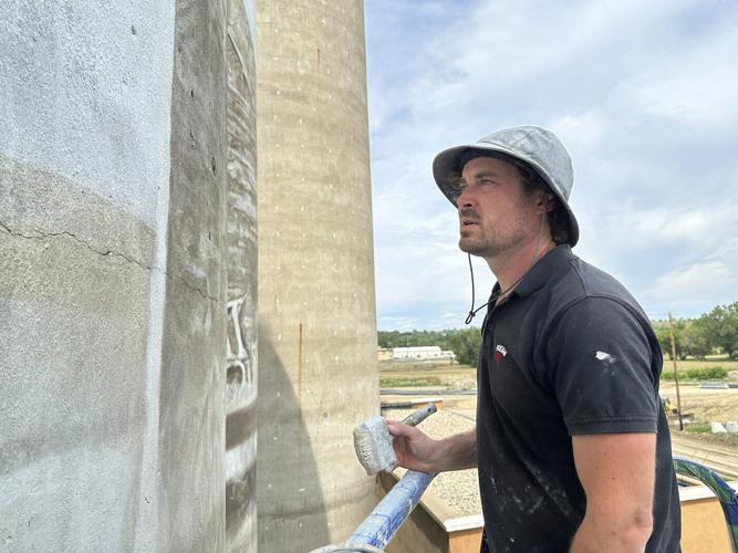 An Australian artist is creating a massive mural in the middle of a small North Dakota town
