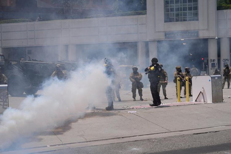 AP PHOTOS: Protesters clash with law enforcement in Los Angeles