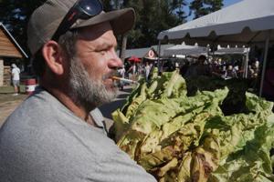 Whether 'stringing' or 'looping,' tobacco is the tie that binds many North Carolina farm families