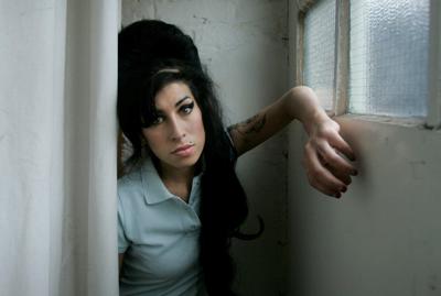 Amy Winehouse's father loses legal bid for funds friends made selling singer's memorabilia