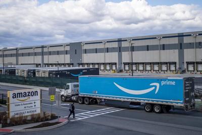 Amazon suspends at least 50 workers after fire protest
