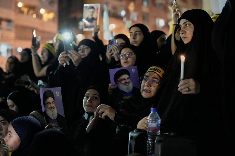 Photos show Hezbollah supporters honoring slain leaders Nasrallah and Safieddine despite PM's ban