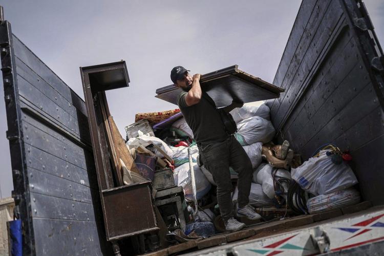 AP PHOTOS: Displaced Syrians Return Home