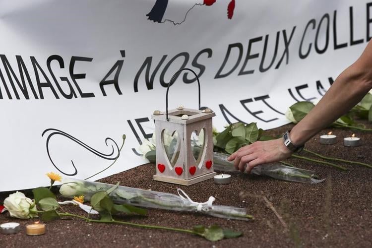 A trial opens in France over the killing of a police couple in the name of the Islamic State group