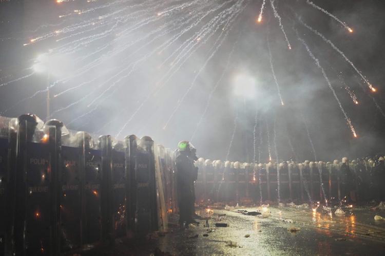 Turkey detains journalists as protests over the jailing of key Erdogan rival rock the country