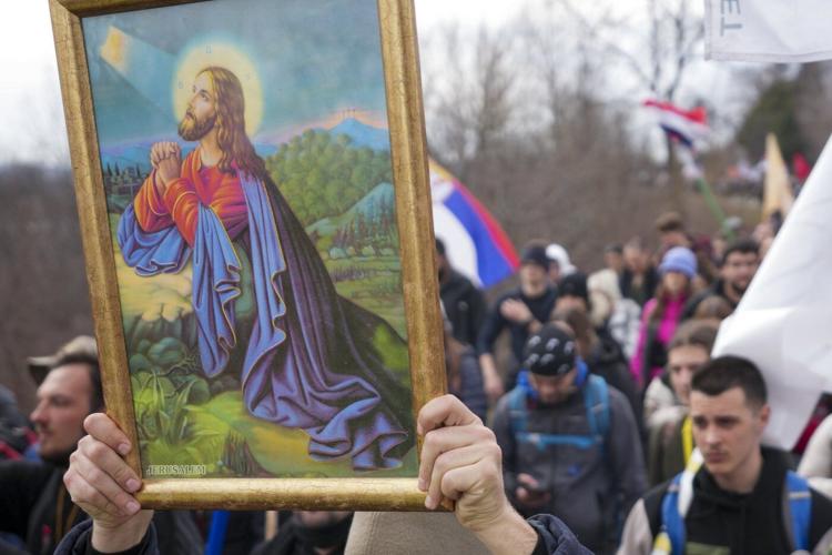 Marching university students in Serbia receive jubilant welcome on the eve of a big anti-graft rally