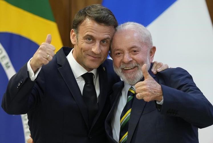 France's Macron embraces Brazil's Lula - and the memes poking fun at their 'wedding'