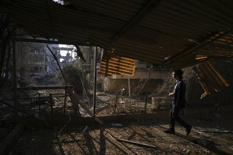 The Latest: Iran fires more missiles at Israel after Israeli military continues strikes