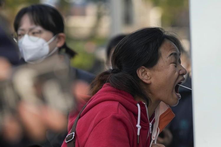 China promises change but sticks to severe 'zero COVID' plan