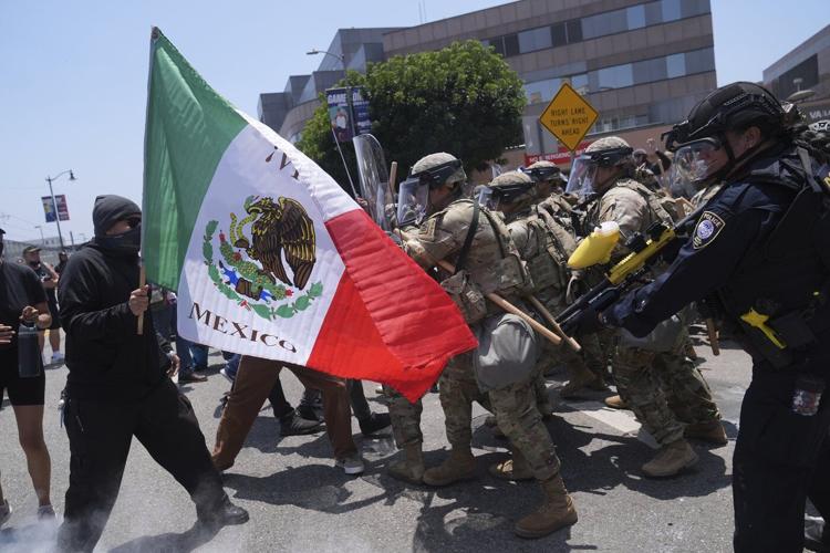 AP PHOTOS: Protesters clash with law enforcement in Los Angeles
