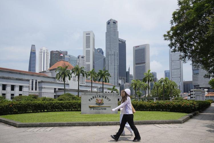 Voting underway in Singapore as its long-ruling party seeks a bigger win