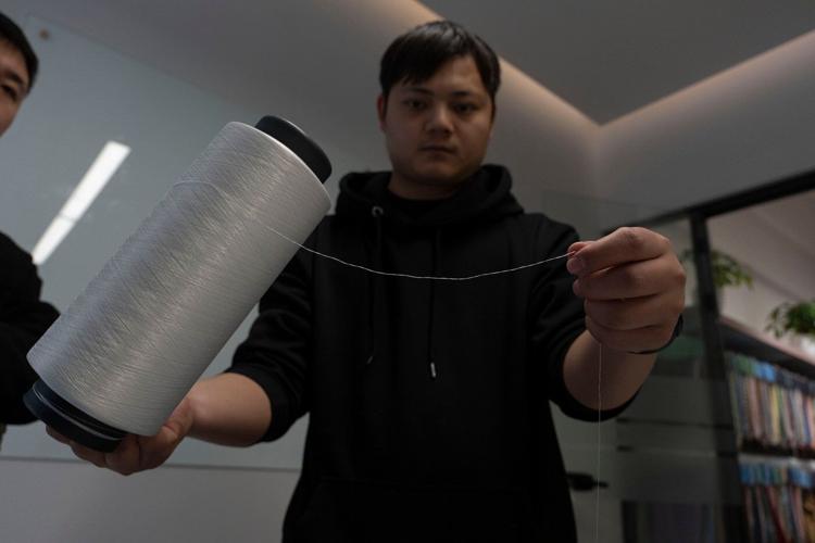 AI machine sorts clothes faster than humans to boost textile recycling in China
