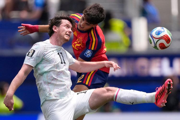 Mikel Oyarzabal's 2 goals send dominant Spain past Austria 3-0 and into round of 16 at the World Cup