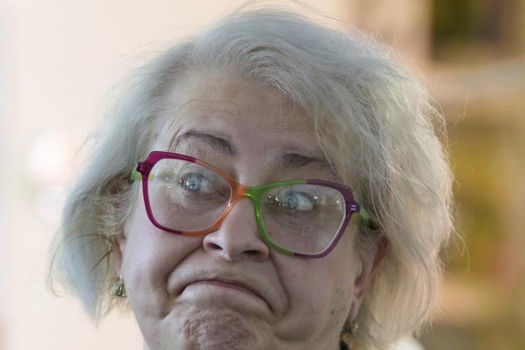 Russian journalist who escaped house arrest in Moscow reappears in Paris after a brutal journey