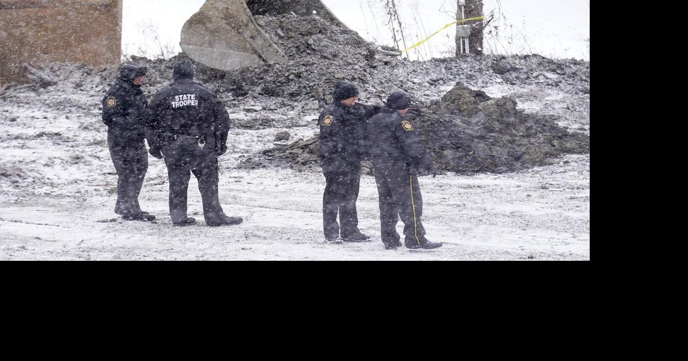 Digging resumes in the search for a woman in a Pennsylvania sinkhole