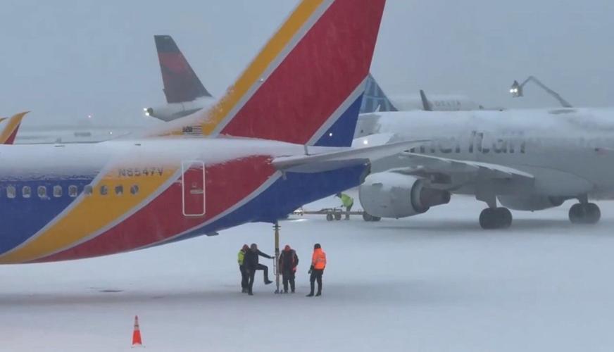 Winter's first big snowstorm hits the Northeast as schools close and traffic slows