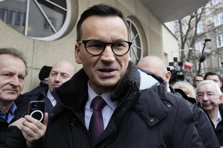 A former Polish prime minister is charged with exceeding his powers over a 2020 election call