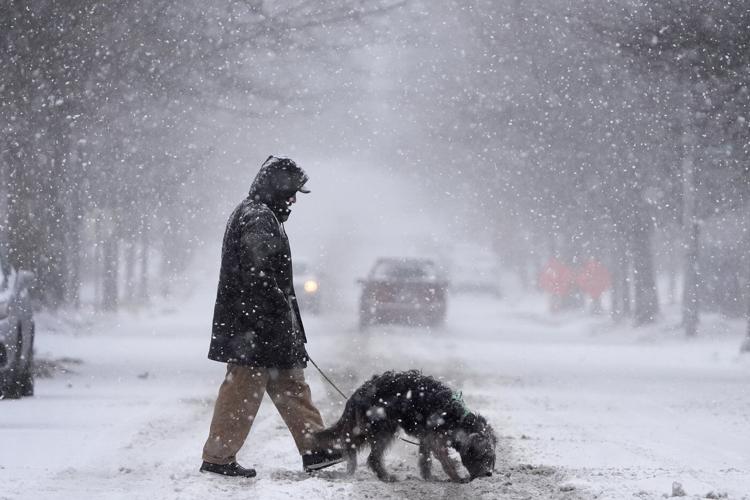 The Latest: Snow, ice and frigid temperatures make for a dangerous winter mix