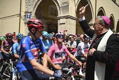 Milan sprints to win crash-affected Stage 2, Evenepoel leads