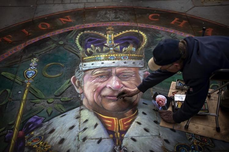 Prince William pours a pint, meets public before coronation