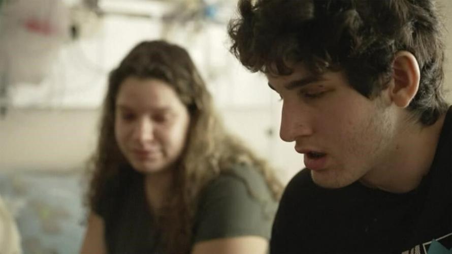 His parents shielded him from gunfire as Hamas attacked. He survived. They did not