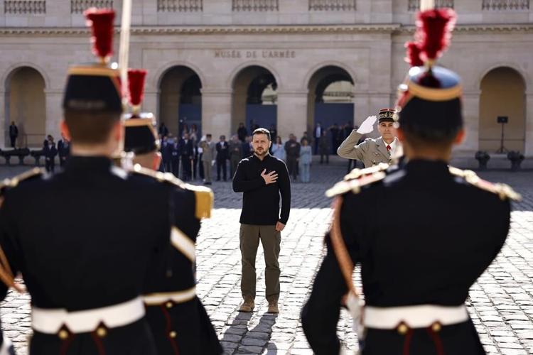 Biden is to meet with Ukraine's Zelenskyy in Paris as Russia leans into its battlefield offensive