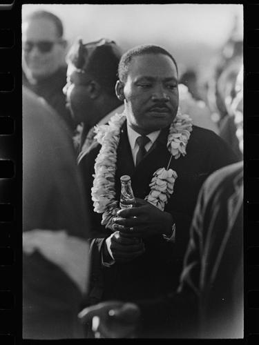Hawaii displays historic photos of Martin Luther King Jr. wearing flower lei during Selma march