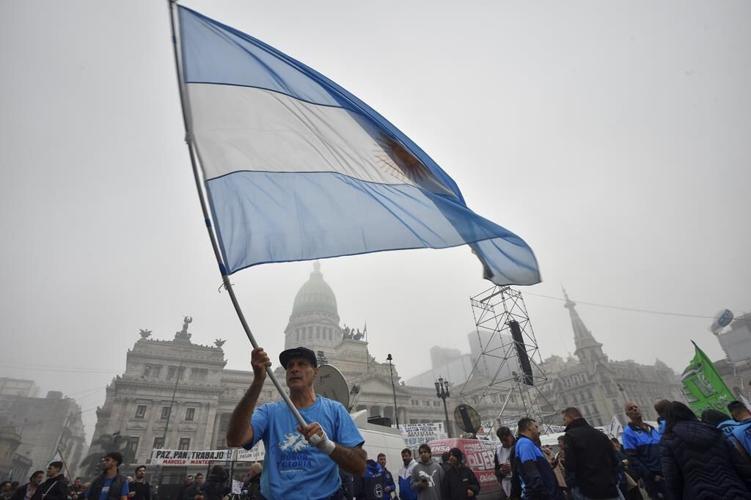 Argentine riot police disperse protesters with water cannons ahead of key Senate vote