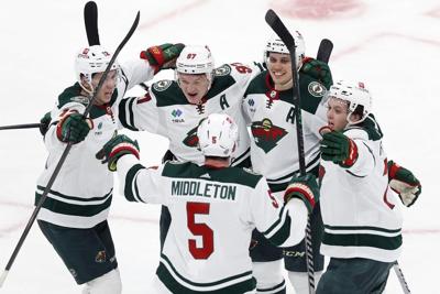 NHL roundup: Kaprizov scores twice, Wild beat Bruins 4-3 in OT