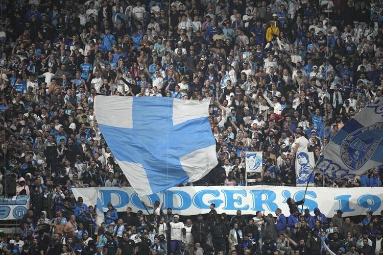 French government says 9 people detained after violent attack on Lyon soccer team buses