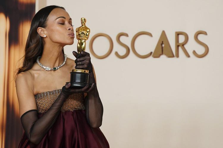 Zoe Saldaña wins first Oscar, sweeping awards season as best supporting actress in ‘Emilia Pérez’