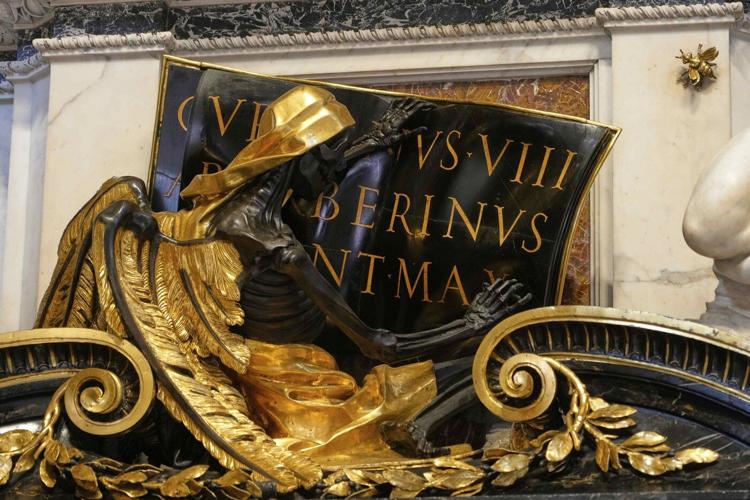 Pope makes another surprise appearance at St. Peter's, greeting restorers of papal tombs