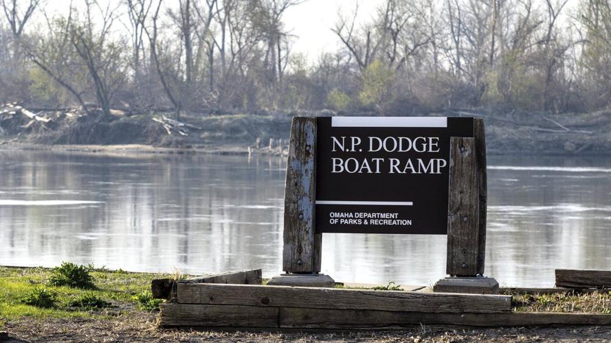 Nebraska officials search the Missouri River near Omaha for two teens and a child