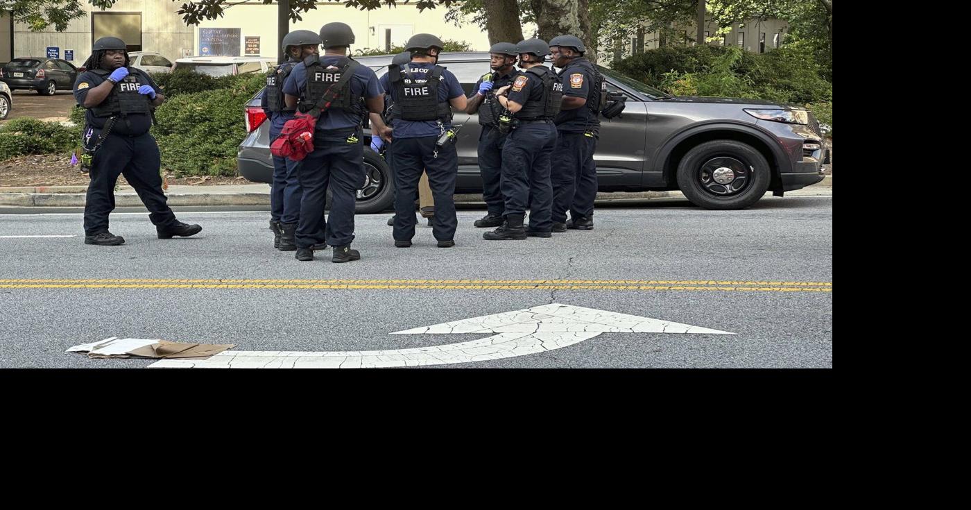 Suspected gunman and police officer dead in shooting near the CDC and ...