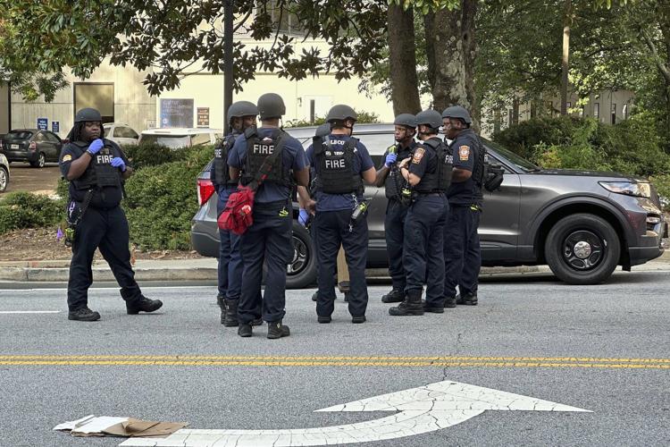Police say a suspect is dead and a police officer has been injured near the CDC and Emory University