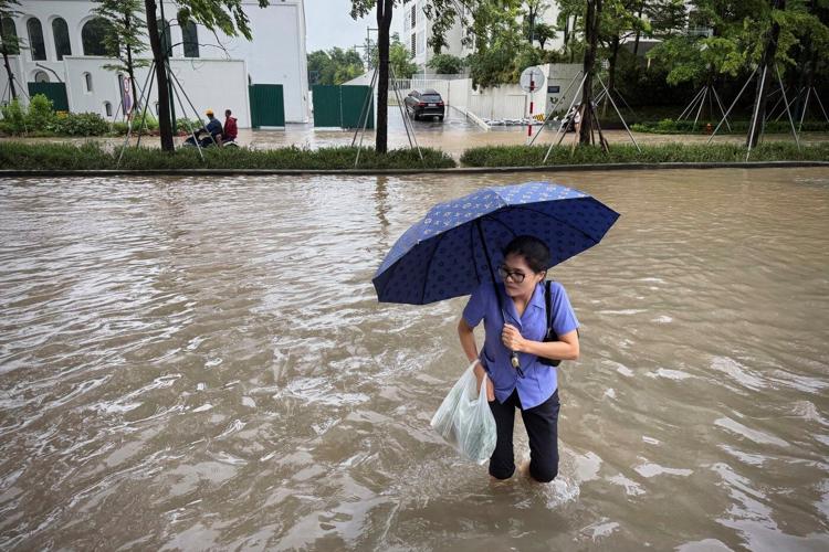 Tropical storm leaves 3 dead in Vietnam and brings heavy rain to parts of Southeast Asia