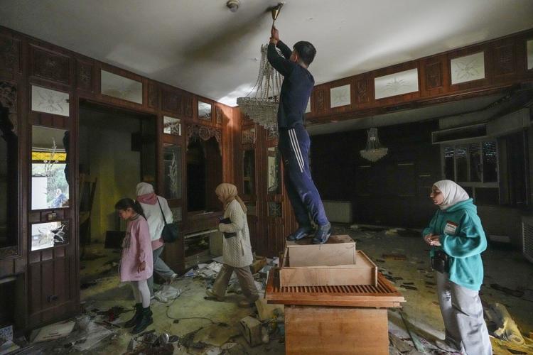 Jubilation and gunfire as Syrians celebrate the end of the Assad family's half-century rule