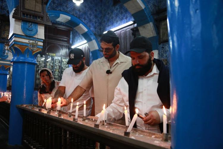 Foreign visitors return to Jewish pilgrimage in Tunisia under tight security