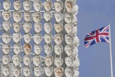 Faces of transgender people adorn an artwork in London's Trafalgar Square