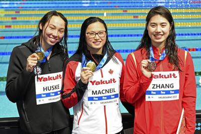 Canada's Maggie Mac Neil wins butterfly gold at short course world championships
