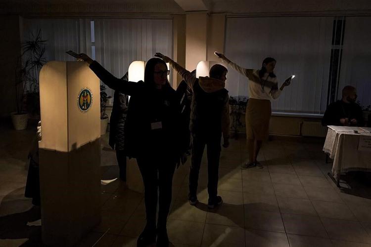 Moldovans cast votes to choose president and decide on EU path as Russian interference claims spike
