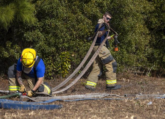 Lighter winds help crews fighting wildfires in South and North Carolina