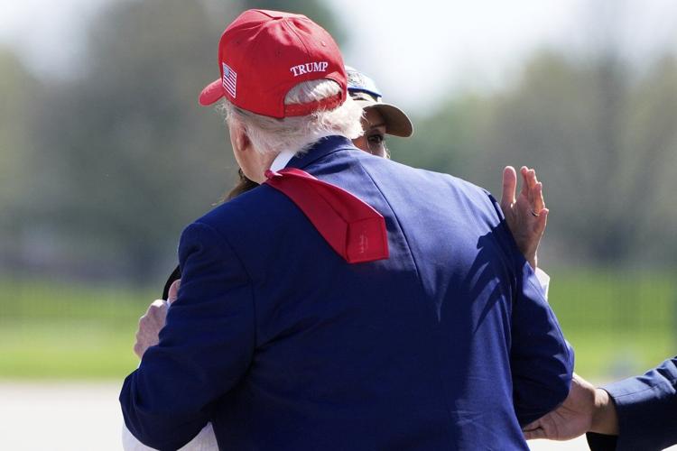 About that hug ... Whitmer risks backlash from Democrats as she embraces Trump in Michigan
