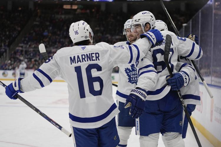 McMann, Woll lead Maple Leafs to 2-1 win over Islanders