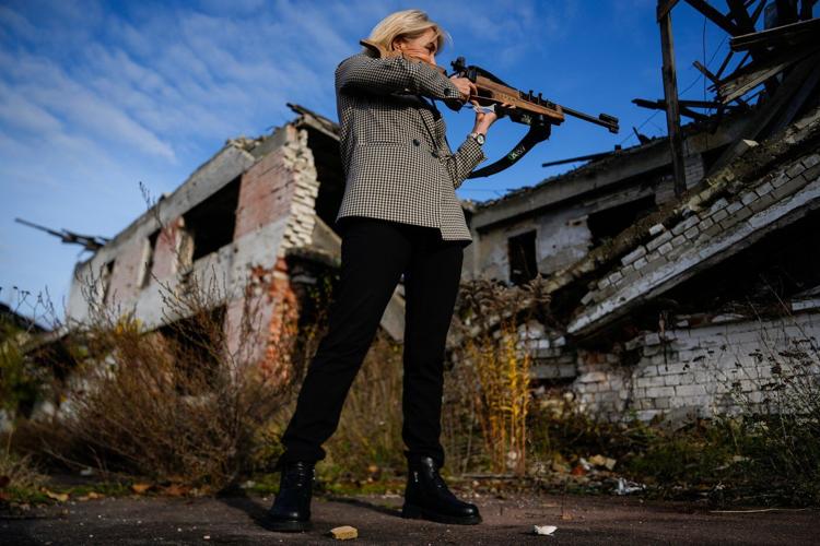 Photos show Ukraine's historic center in ruins but children, athletes still train ahead of Olympics