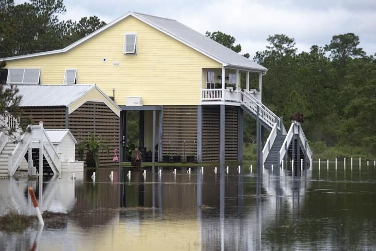 Francine weakens and moves inland after lashing Louisiana